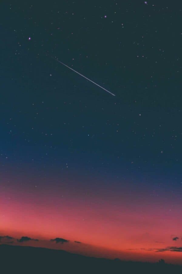 shooting star in night sky