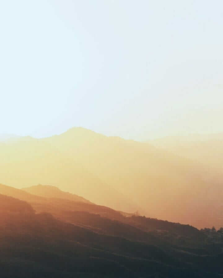 silhouette of mountains during daytime
