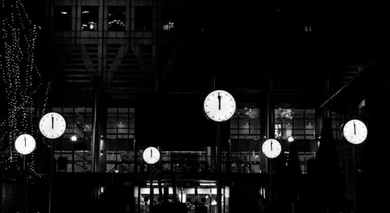 grayscale photo of people walking on street
