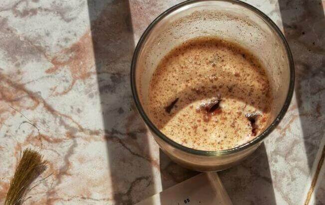 white ceramic mug on white paper