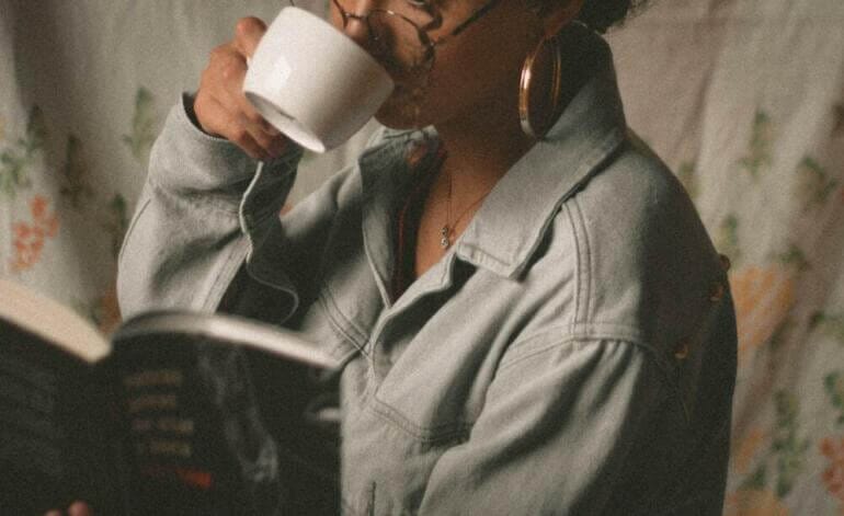 Woman Drinking Coffee in White Ceramic Mug